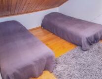 furniture, indoor, couch, bed, floor, pillow, sofa bed, studio couch, chair